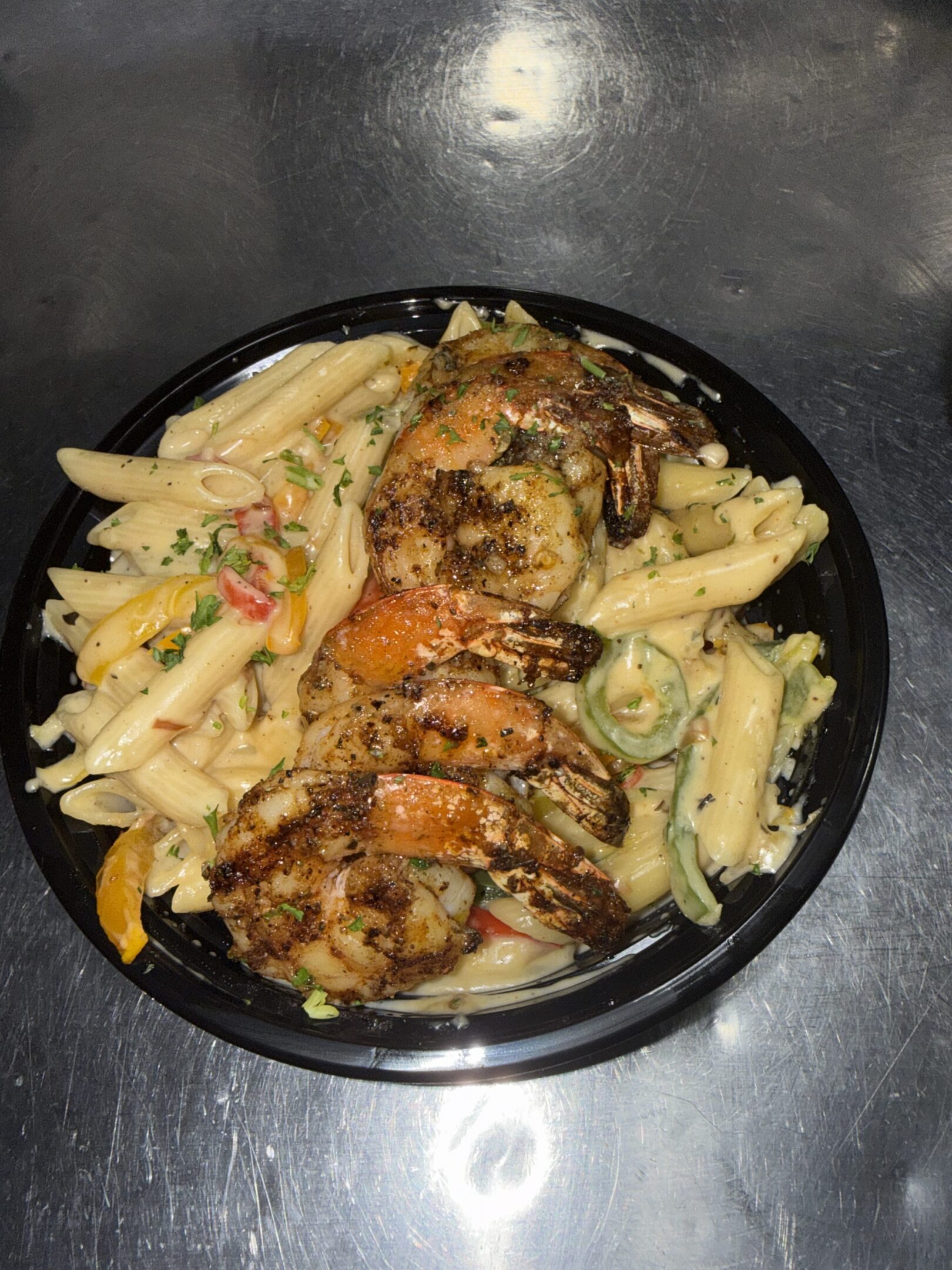 Grilled shrimp penne pasta with creamy sauce