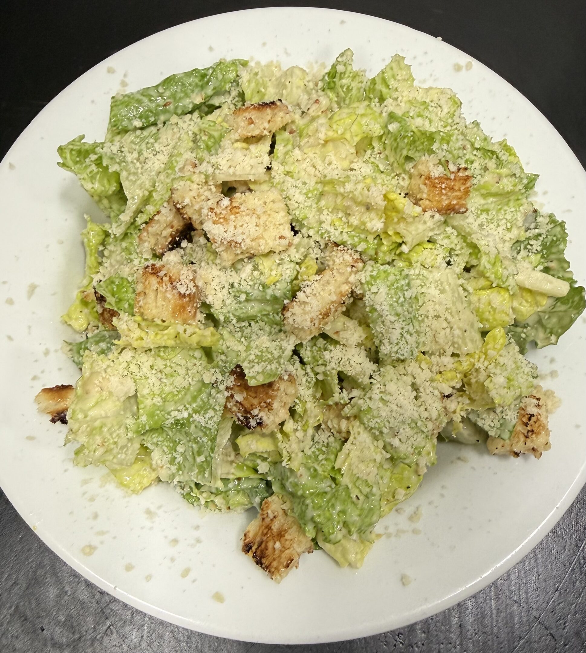 Caesar salad with croutons and parmesan