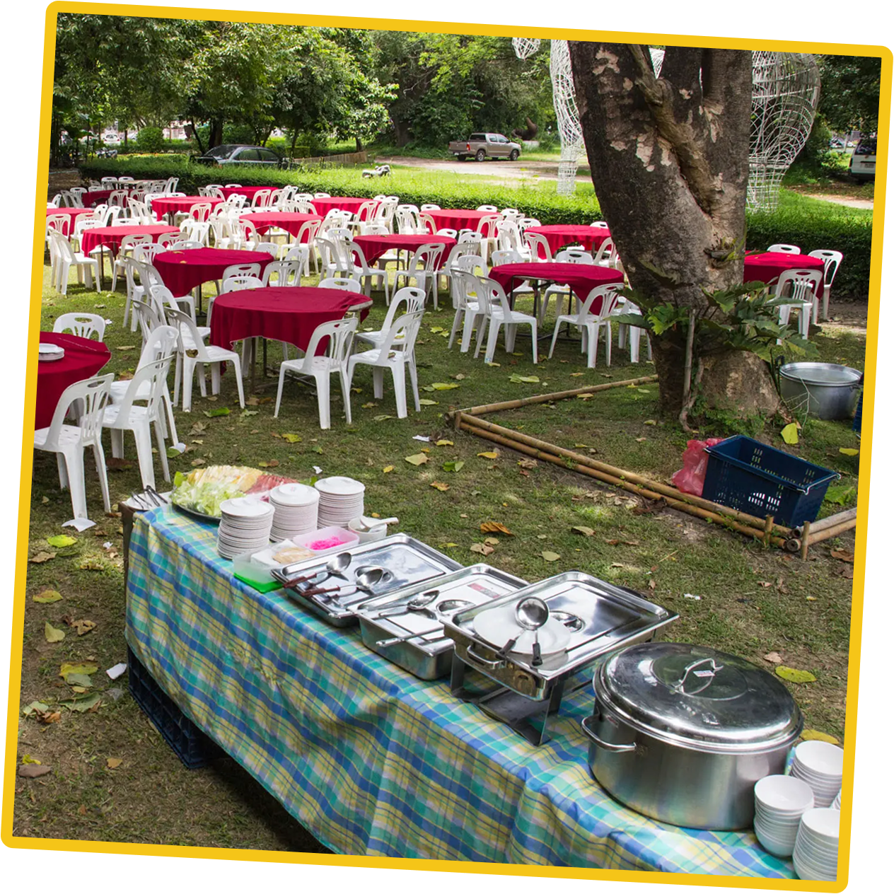 Outdoor buffet with red tablecloths