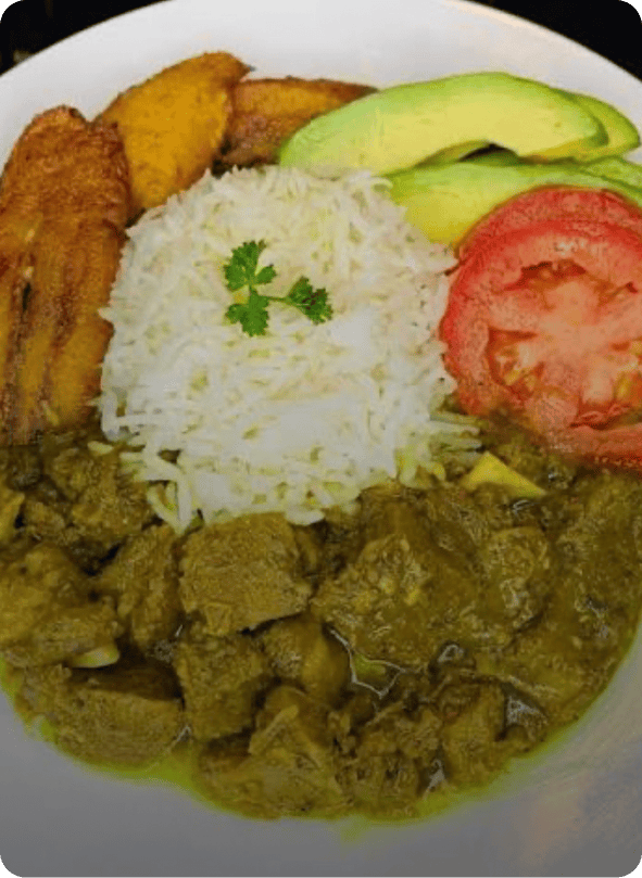 White rice with green stew, avocado, plantains