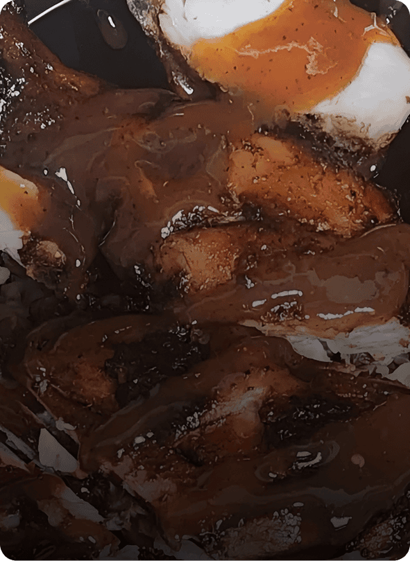 Melted marshmallows drizzled with rich chocolate sauce